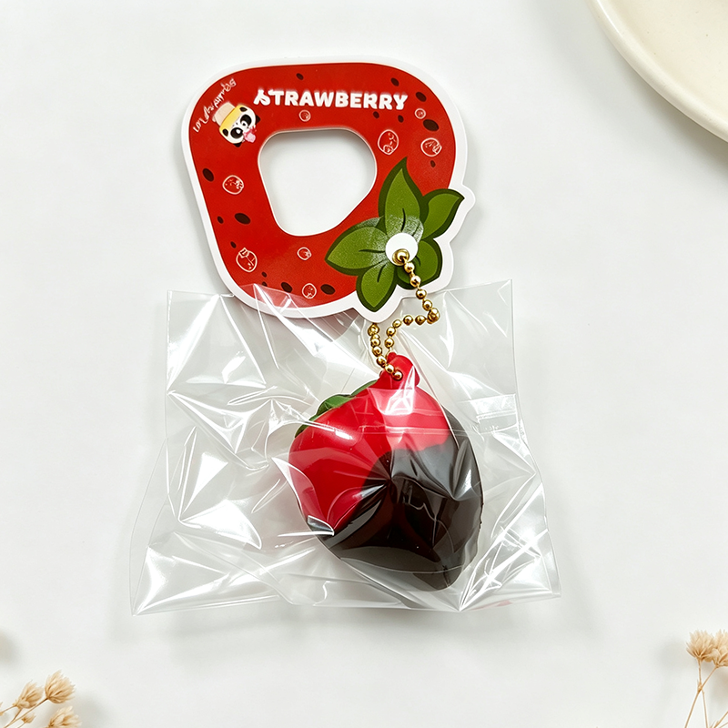 Strawberry Squeeze Toy Charm
