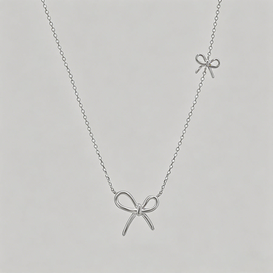 Double Bow Charm Silver Neckla - Shopdayla Wholesale - #9586