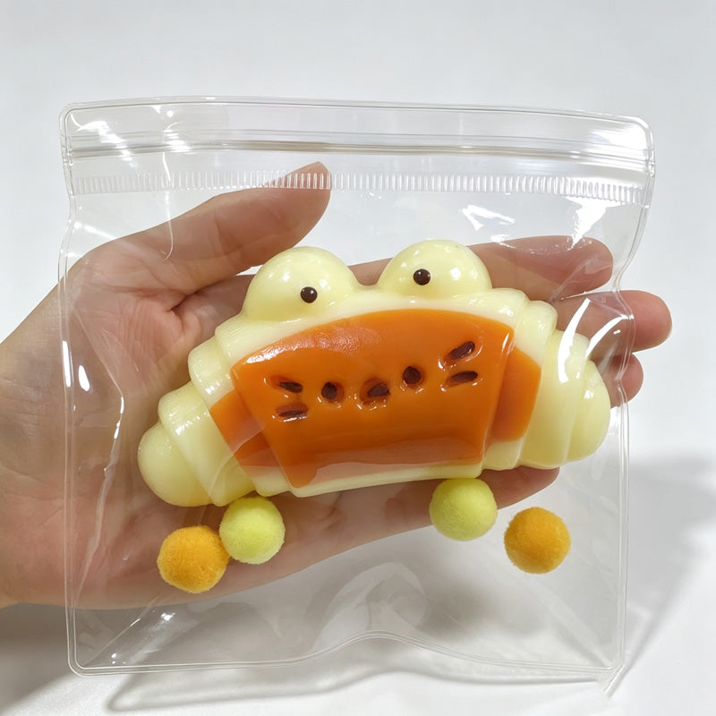 Crocodile Croissant Squish Toy