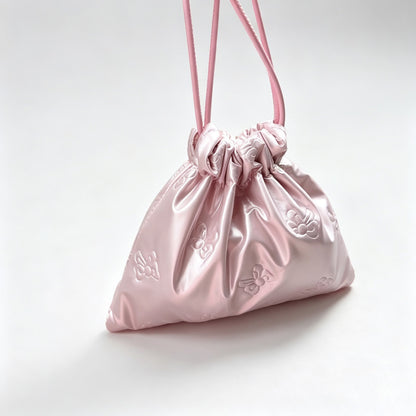 Embossed Bow Drawstring Storage Pouch