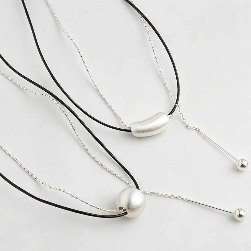 Modern Minimalist Brushed Oval Bead Leather Necklace
