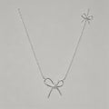 Double Bow Charm Silver Neckla - Shopdayla Wholesale - #5122