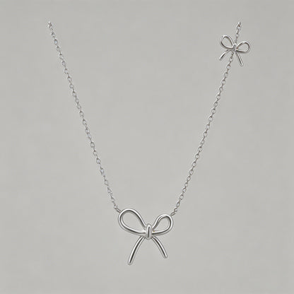 Double Bow Charm Silver Neckla - Shopdayla Wholesale - #5122