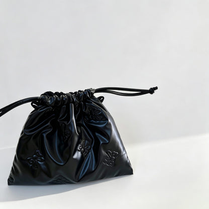 Embossed Bow Drawstring Storage Pouch