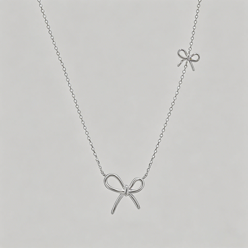 Double Bow Charm Silver Neckla - Shopdayla Wholesale - #9586