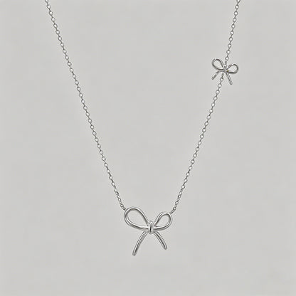 Double Bow Charm Silver Neckla - Shopdayla Wholesale - #9586